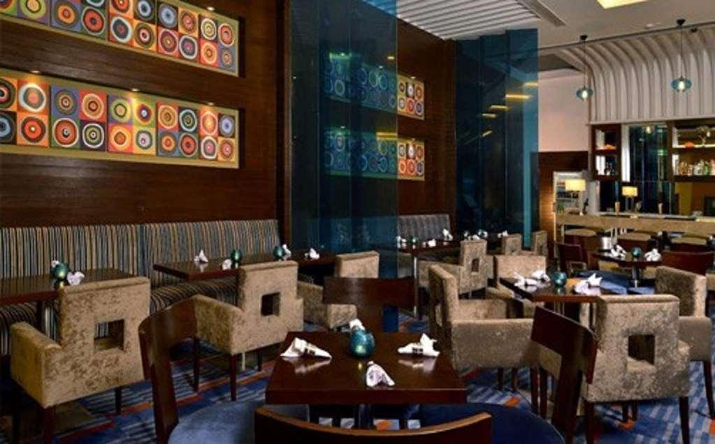 塞德拉瓦里橙园财富酒店 Bhiwadi 餐厅 照片
